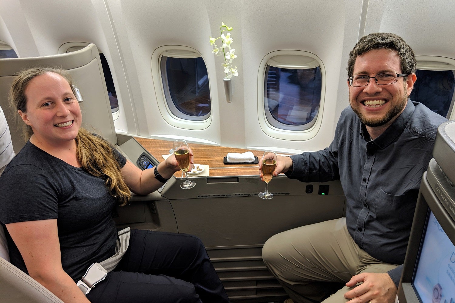 Cathay Pacific First Class as a couple with Krug champagne