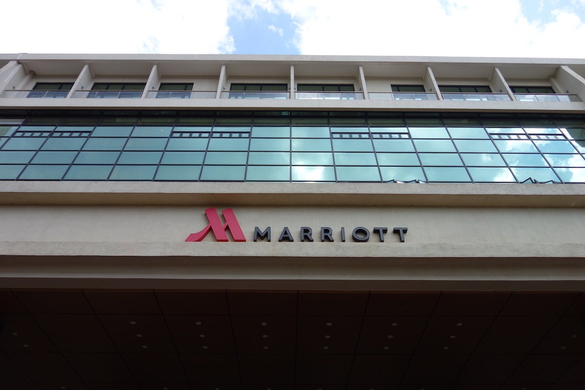 a Marriott logo above a hotel entrance