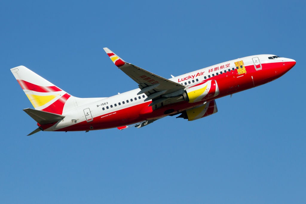 A Lucky Air Boeing 737-700 climbing out from Sanya Phoenix