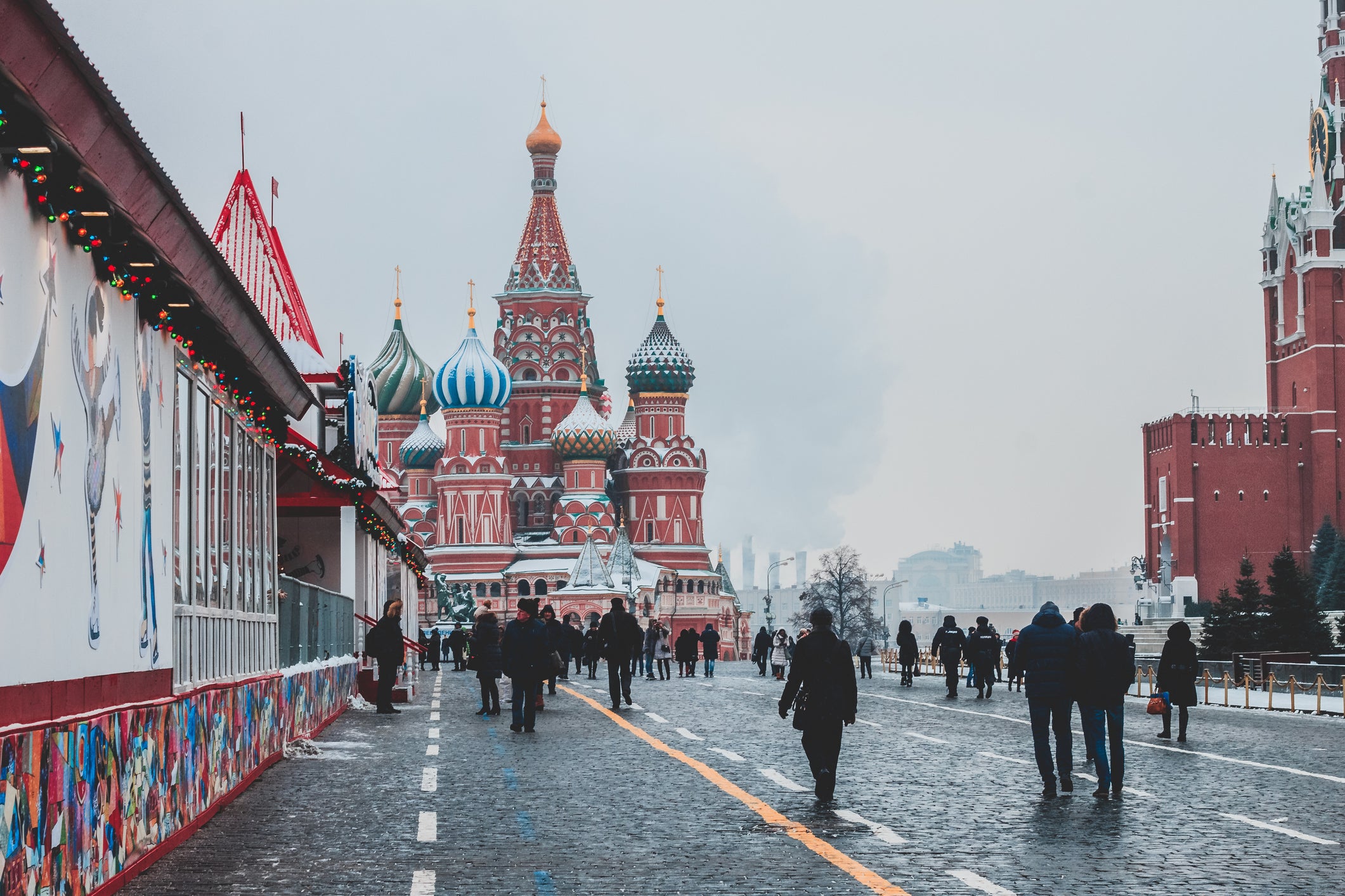 People On Street Against St Basil Cathedral During Winter