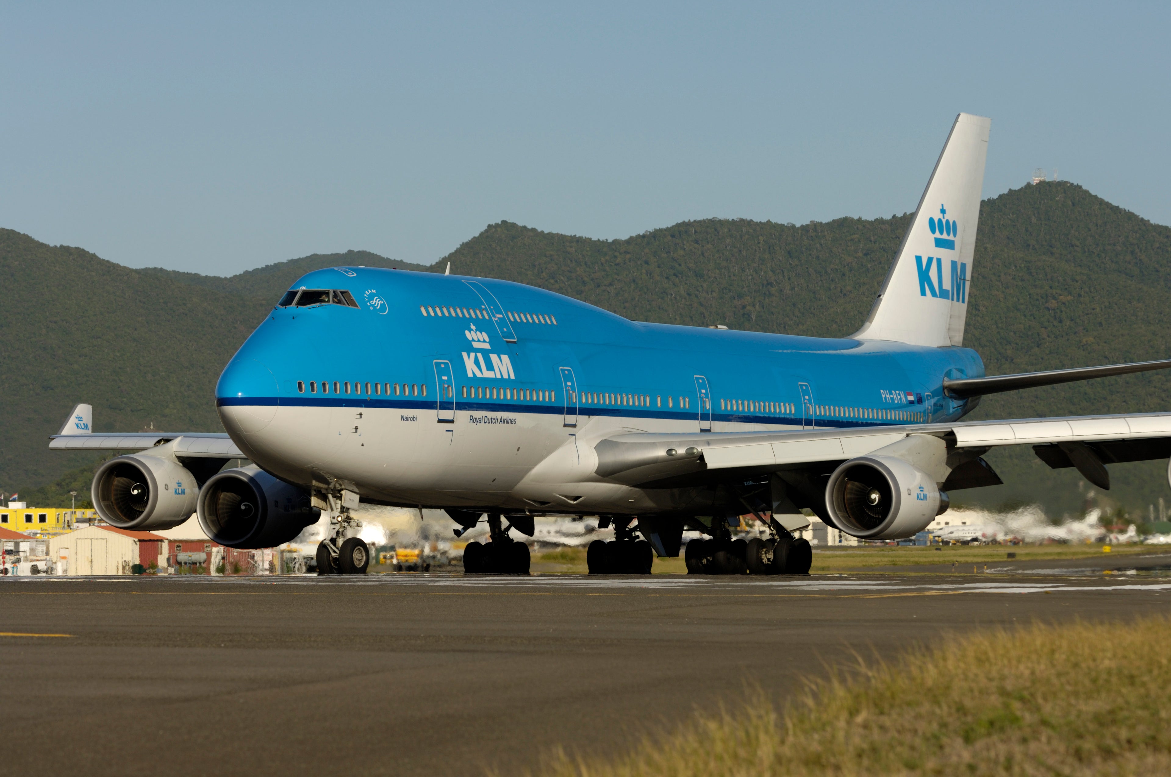 aircraft taxiing with hills in background