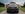 Black luxury car in the country