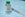 MMR vaccine holding in hand with injection syringe at the background (via Getty Images)
