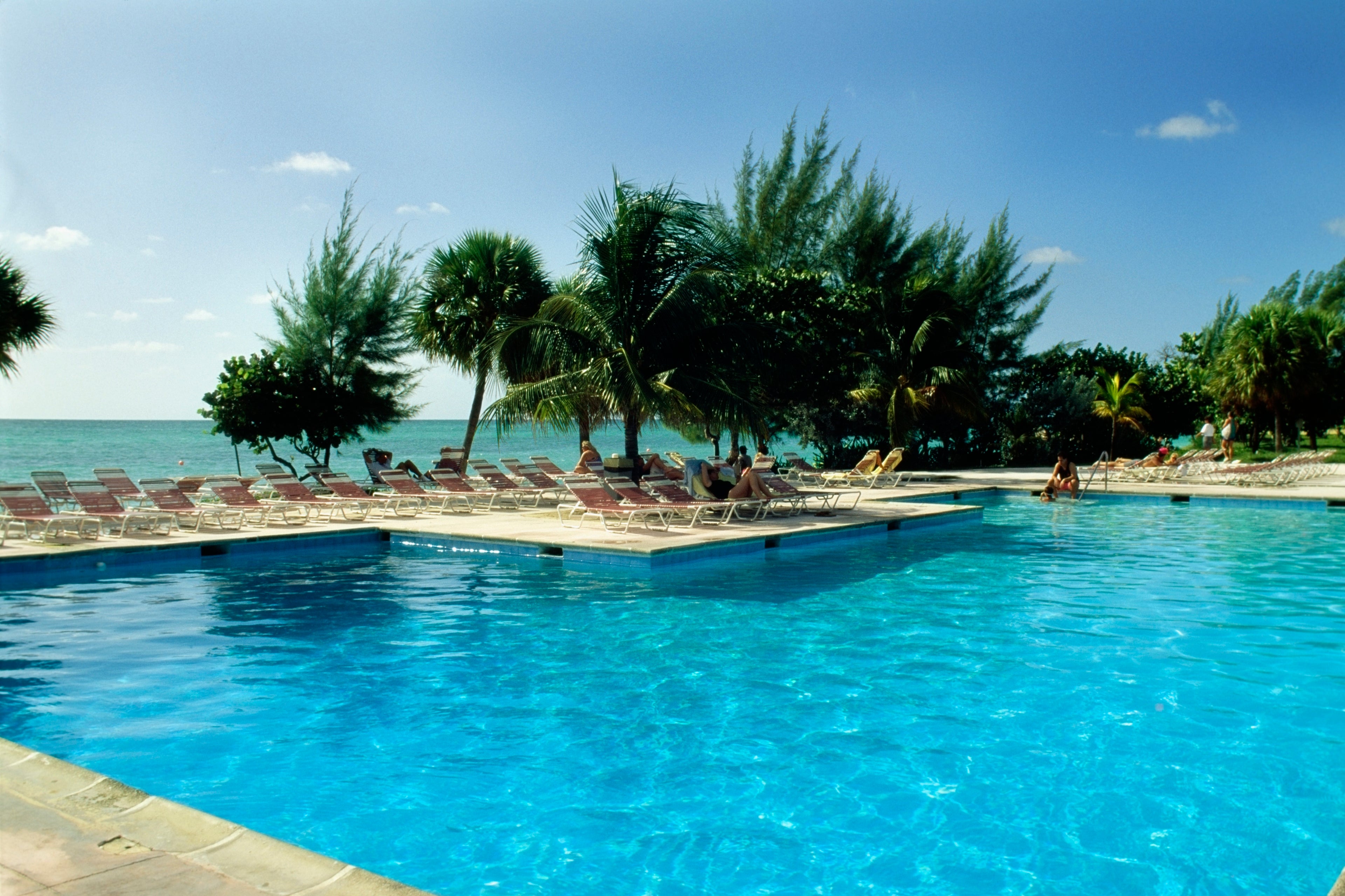 High angle view of a clear swimming pool at Lucayan Beach Resort, Freeport, Bahamas