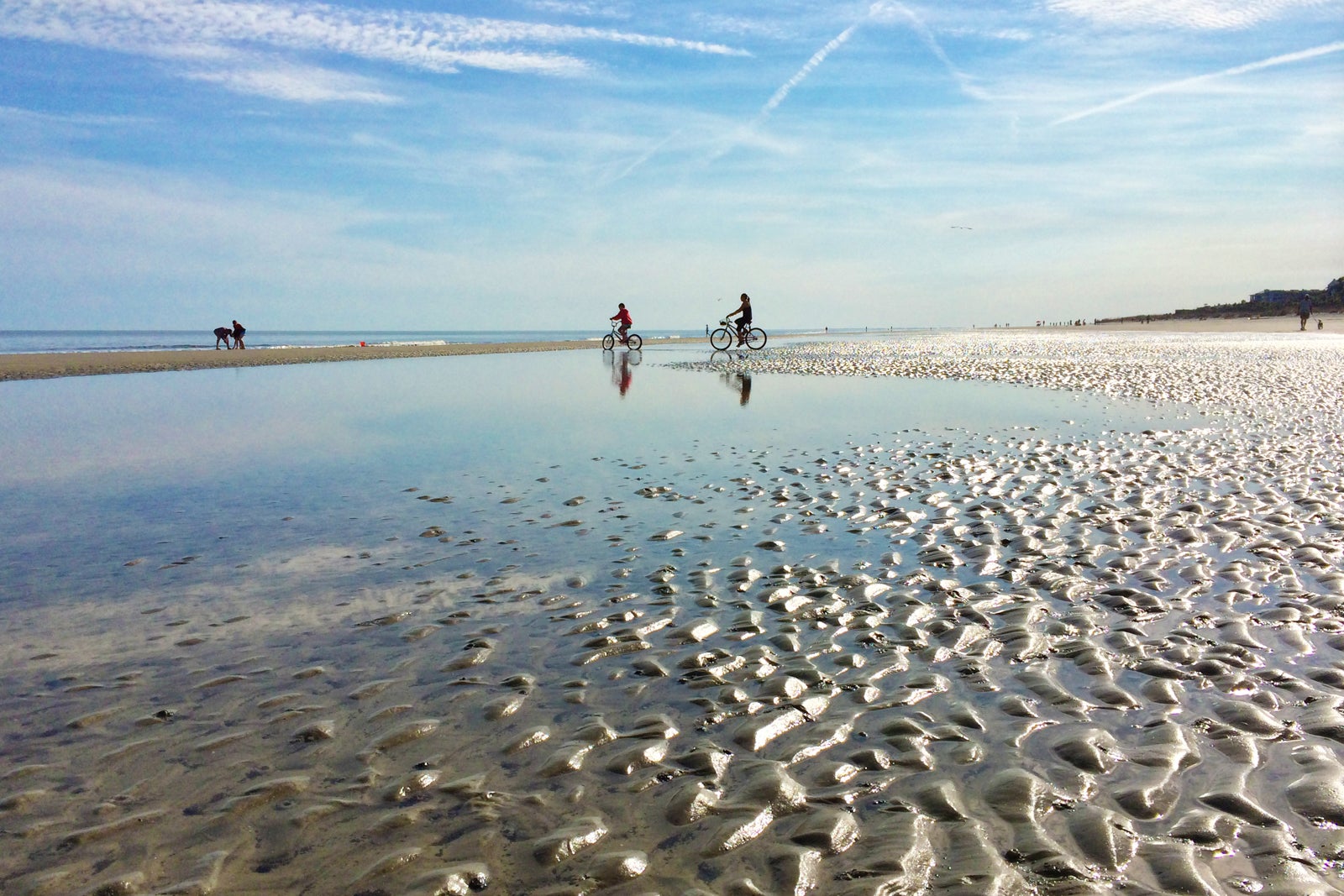 Bicycling on the beach at low tide