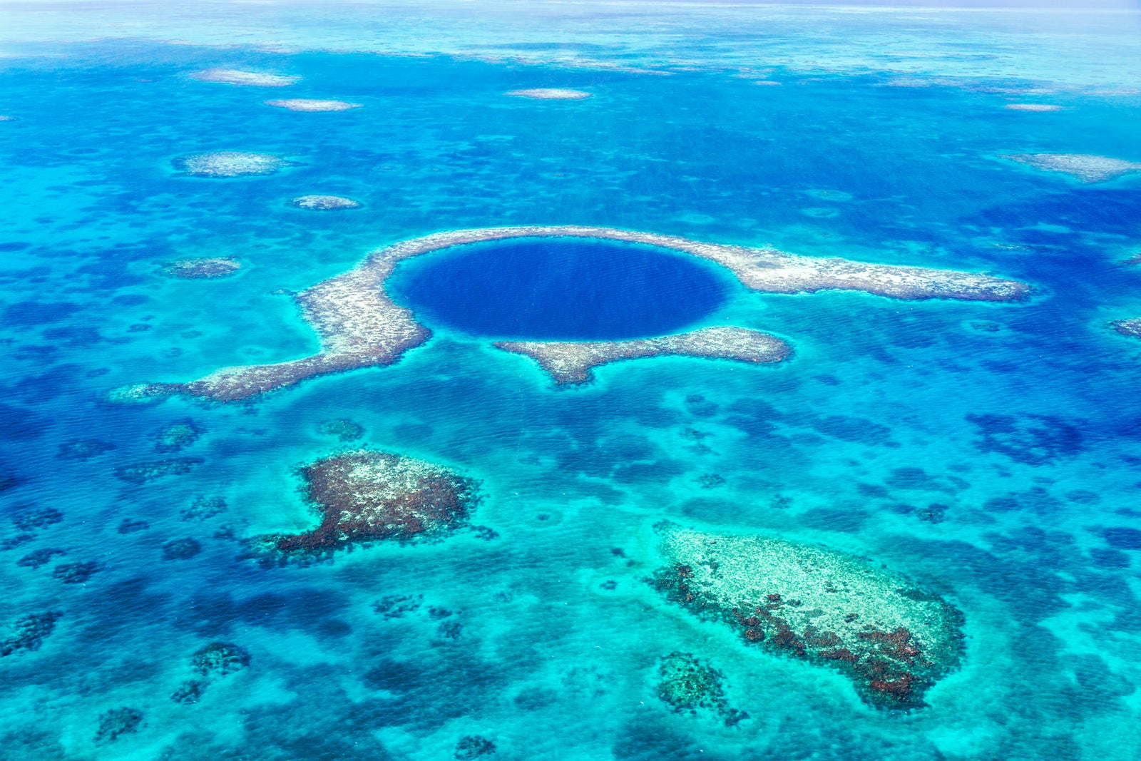 Aerial photo of the Blue Hole, Lighthouse reef, Belize.