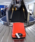 How to avoid checked baggage fees on major domestic airlines