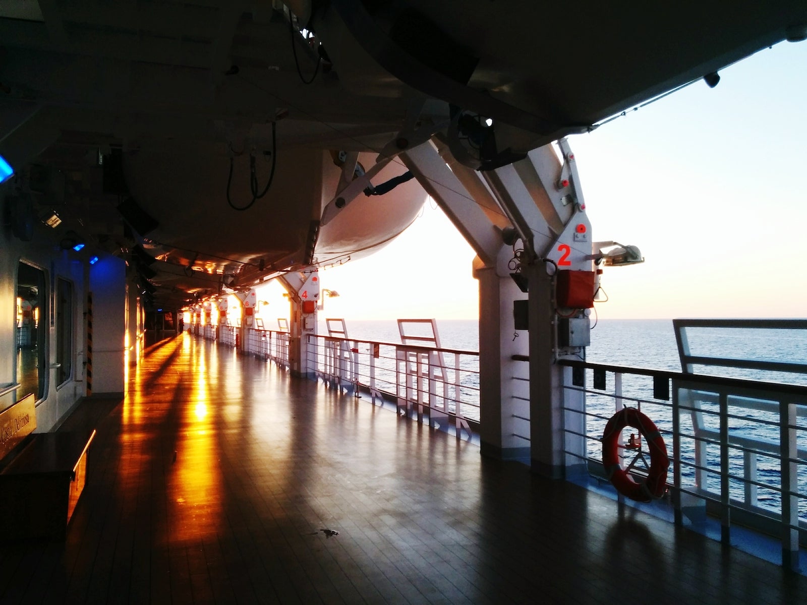 Sunlight Falling On Boat Deck On Sea