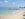In his early days of consulting Raymond Lin and his colleagues spent an alternate weekend on 8 mile beach in Grand Cayman.