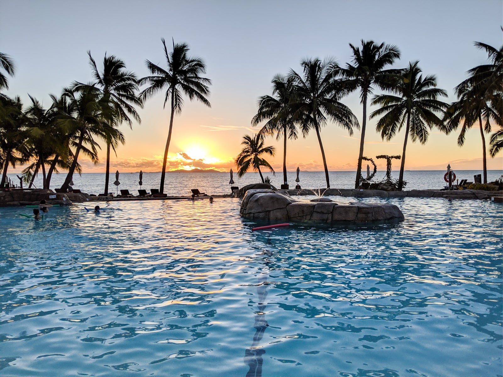 Hilton Doubletree Fiji pool sunset