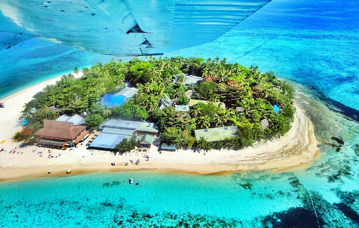 Aerial View Of Island Seen Through Airplane