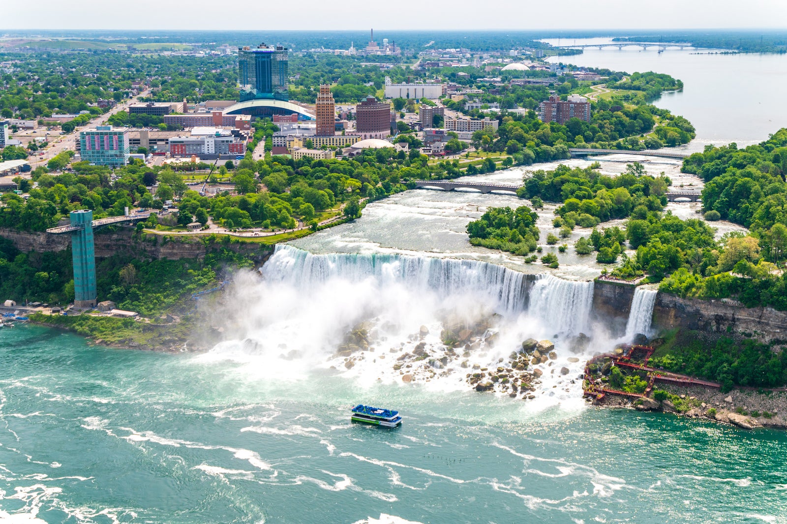 High angle view of a tourboat in the American and Bridal Veil waterfalls in Niagara falls