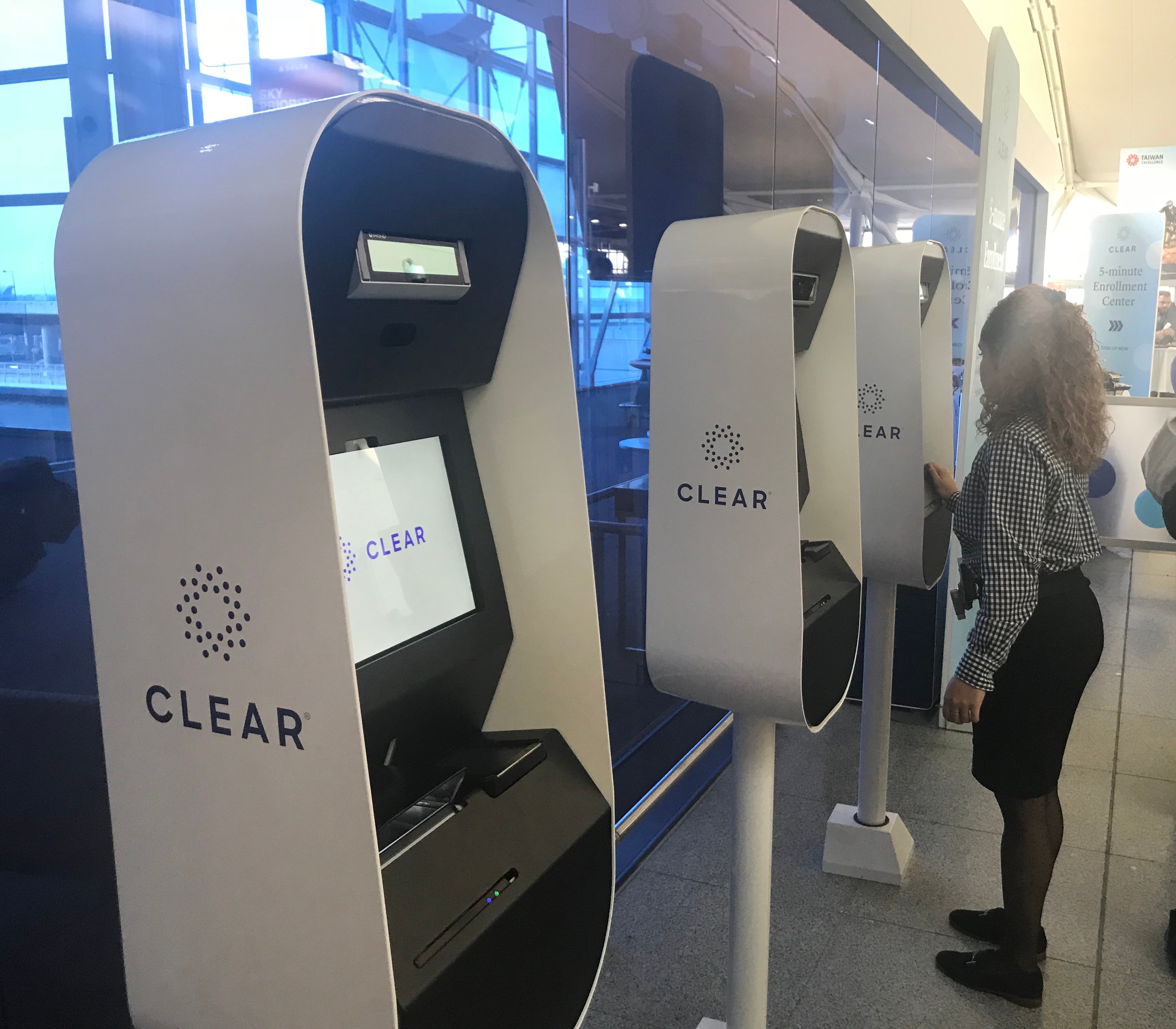 Customers user CLEAR kiosks at New York JFK airport. (Courtesy of Delta Air Lines)