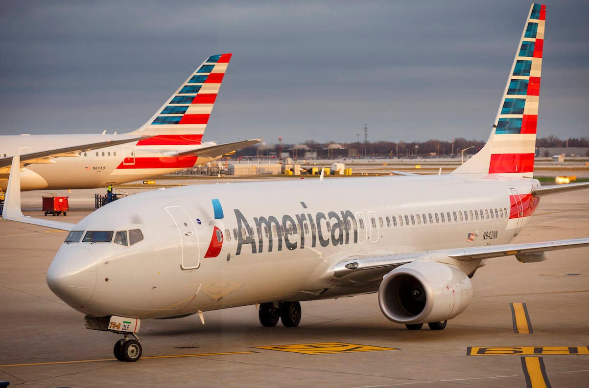 An American Airlines plane heads to the gate at Chicago's O'Hare International Airport, on Christmas day December 25, 2015. (Photo by John Gress/Corbis via Getty Images)