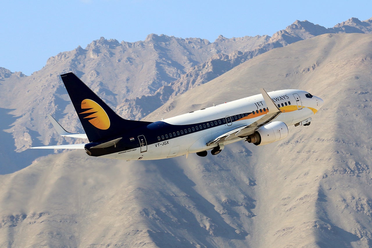 Jet Airways flying out of a Leh Airport in Ladakh, Jammu Kashmir