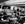 2nd January 1970: BOAC air stewards tend to rows of passengers seated in the new Boeing 747 wide-cabined jumbo jet. (Photo by Fox Photos/Getty Images)