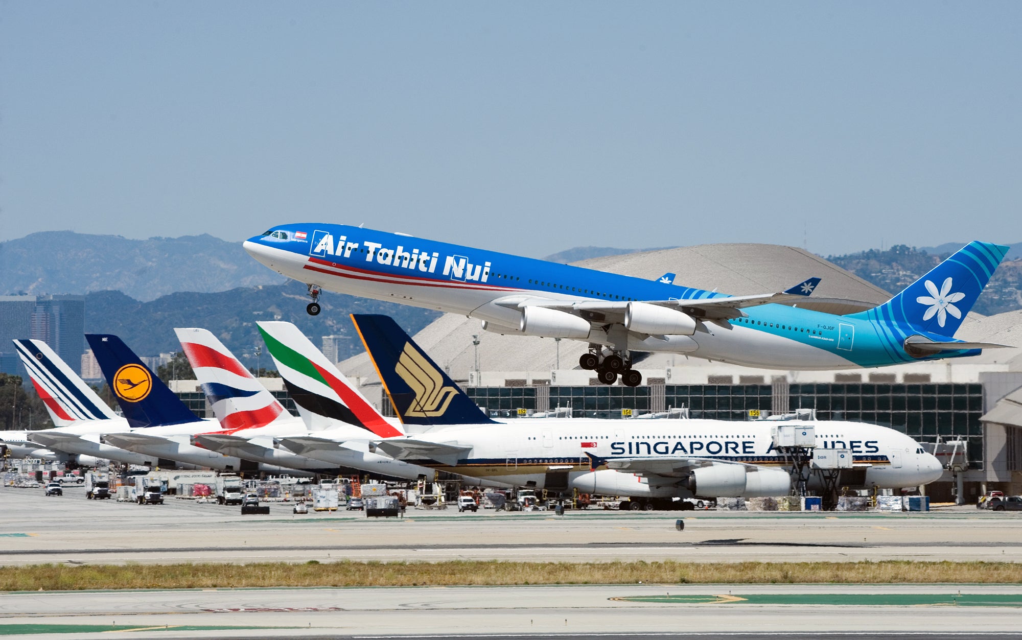LAX Air Tahiti Nui A340 and parked A380s