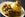 Puerto Rican Mofongo made from plantains, garlic and chicharron served with meat and broth close-up on a plate on the table. horizontal