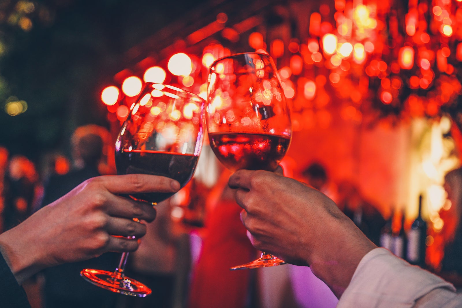 Couple toasting wine glasses