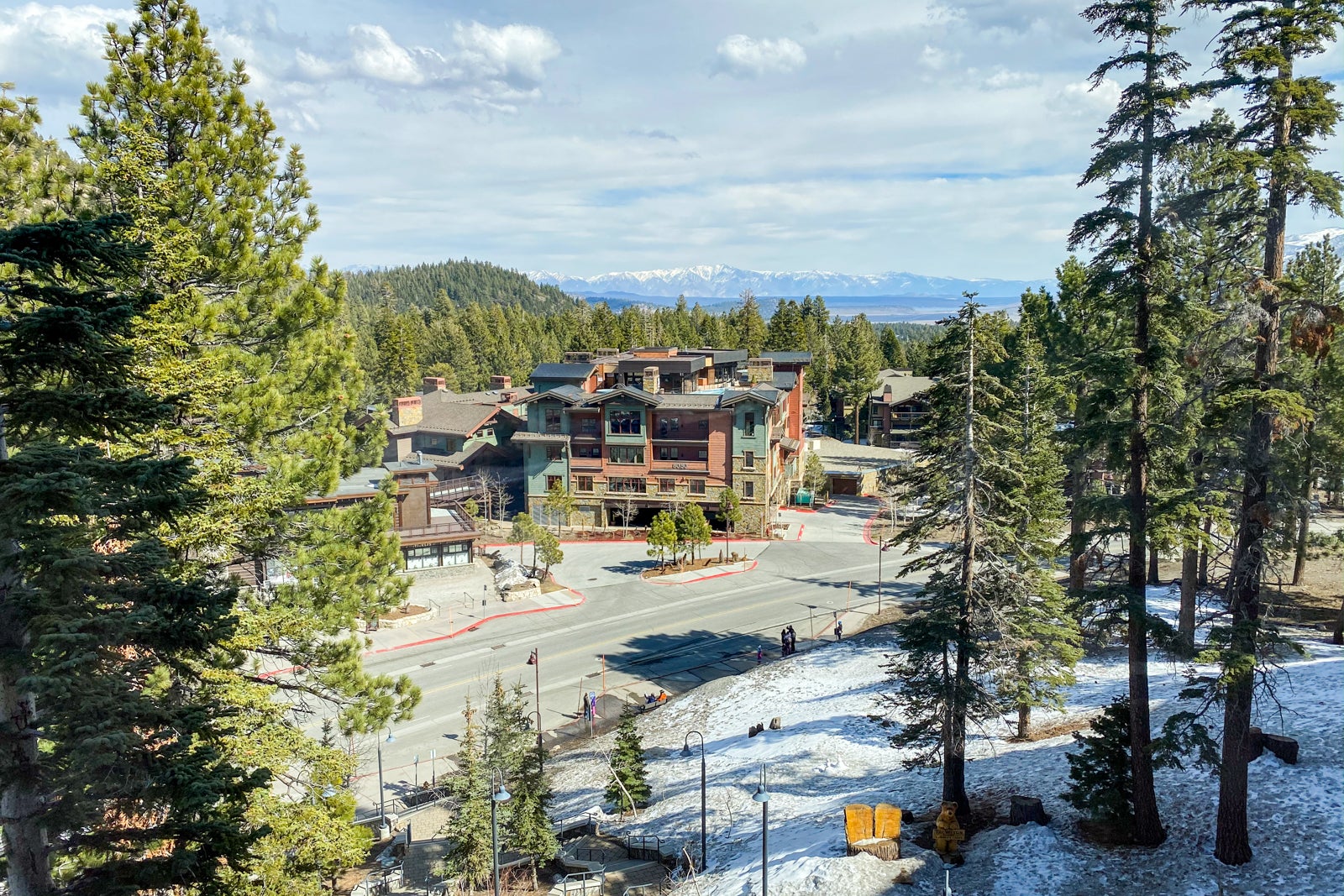 Long shot of Westin Mammoth with snow and trees
