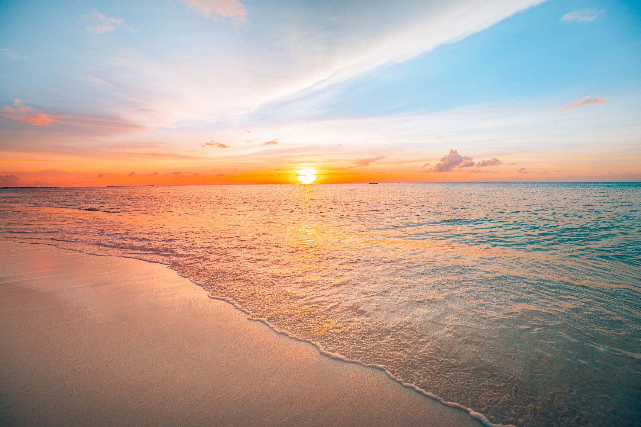 Sunset sea landscape. Colorful ocean beach sunrise. Beautiful beach scenery with calm waves and soft sandy beach. Empty tropical landscape, horizon with scenic coast view. Colorful nature sea sky