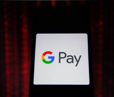 In this photo illustration a Google Pay logo seen displayed