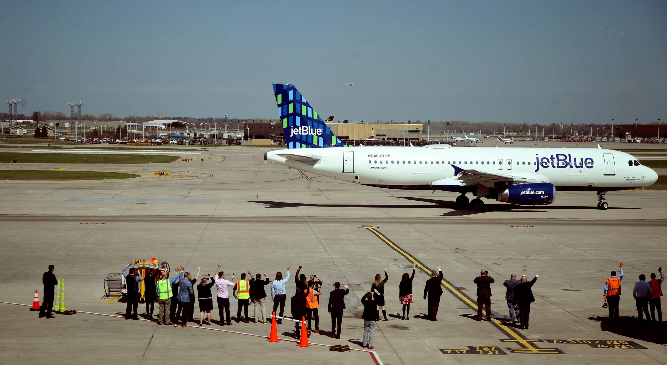 JetBlue's head of air service, and ground crew members waved goodbye as JetBlue flight 836 begins service at MSP to Boston Thursday May 3, 2018 Bloomington, MN. ] JERRY HOLT ‚Ä¢ jerry.holt@startribune.com