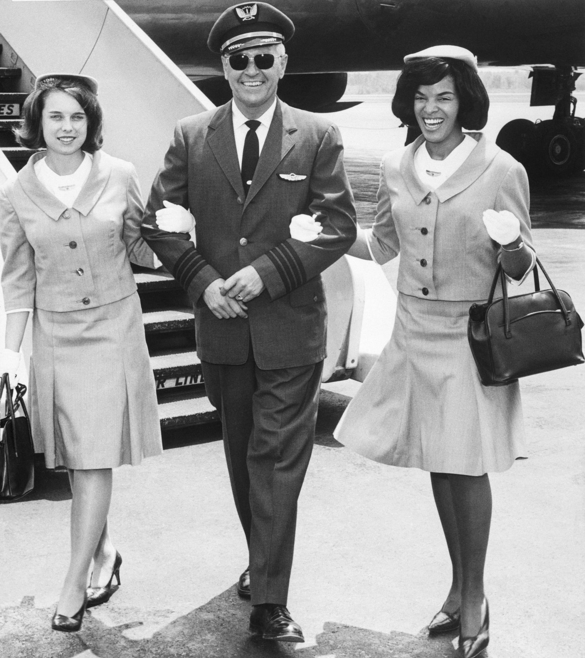 Flight attendants have been looking after US passengers for 90 years ...