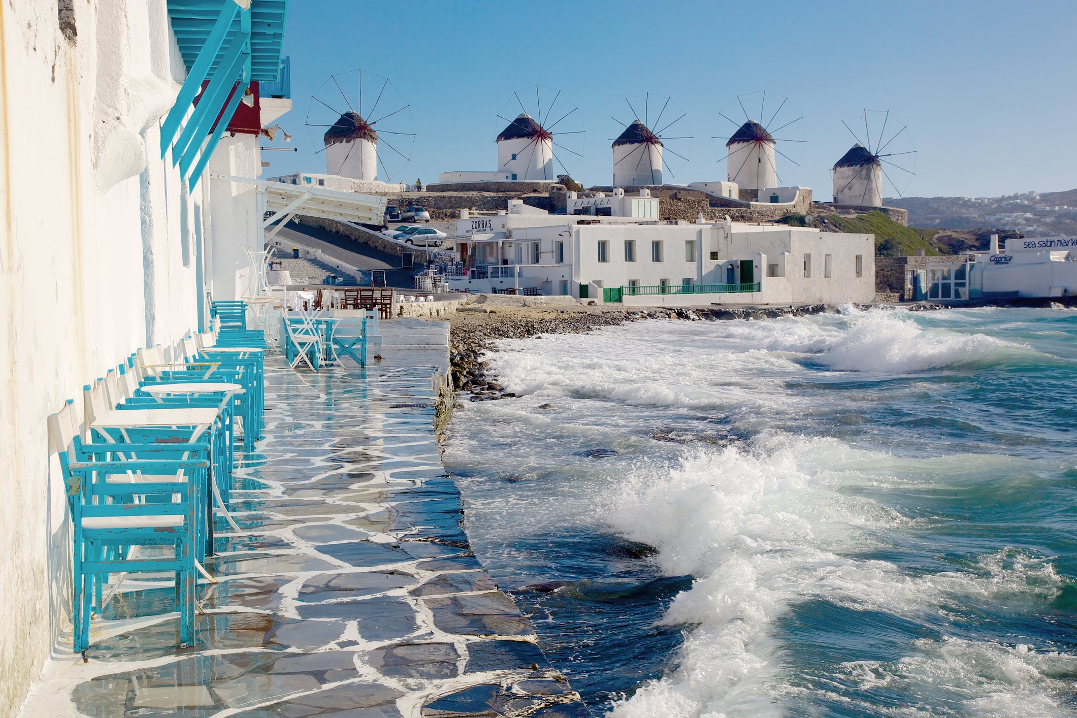 Cafe and windmills in Mykonos, Greece