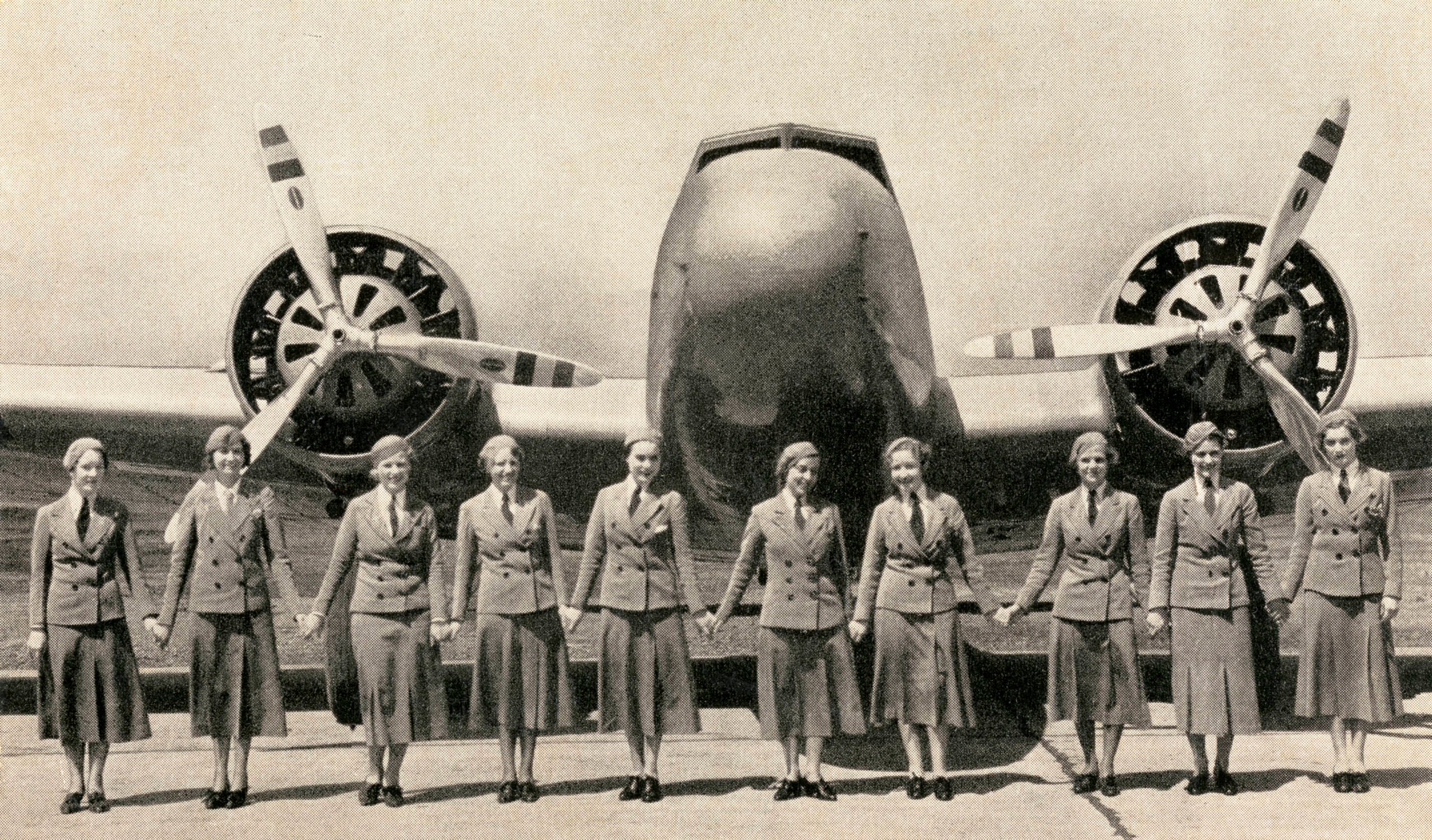 Stewardesses And Airliner
