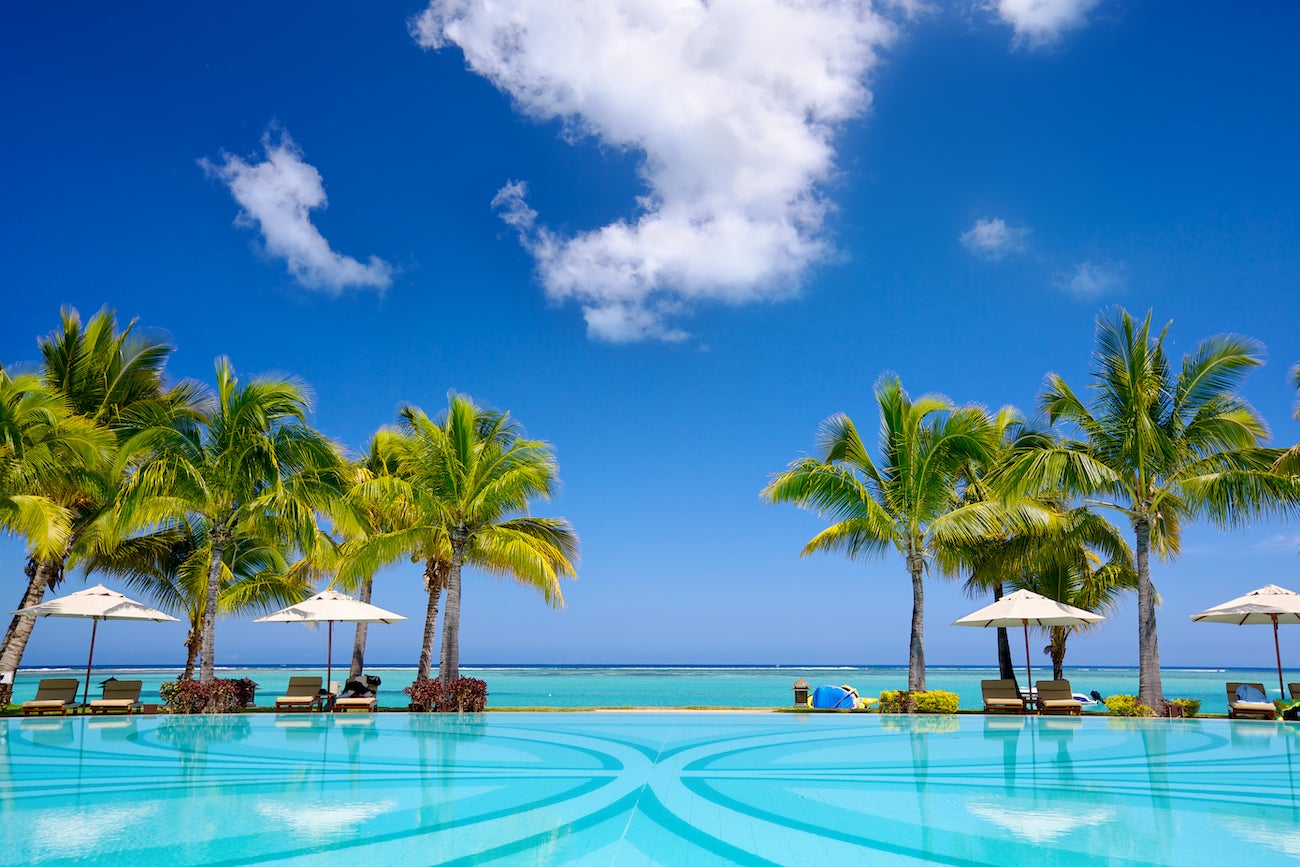 Palm Trees over a pool