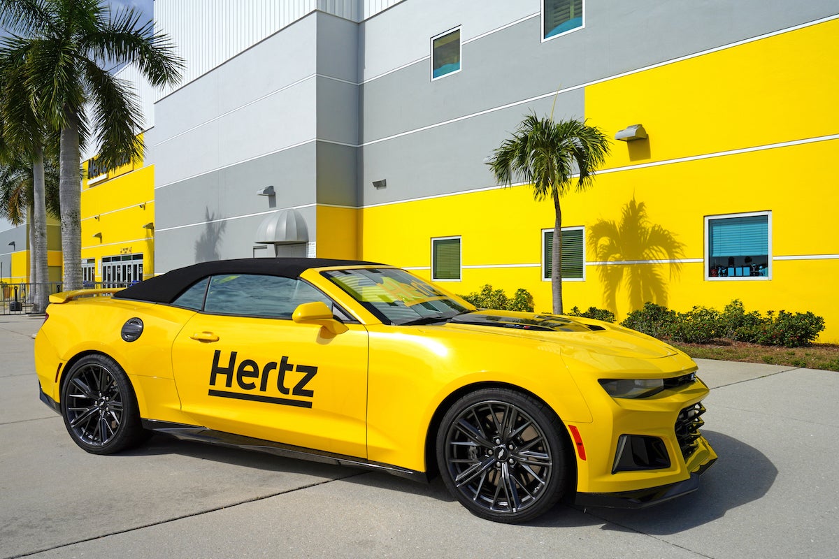 Yellow Hertz Branded Camero Outside Hertz Building