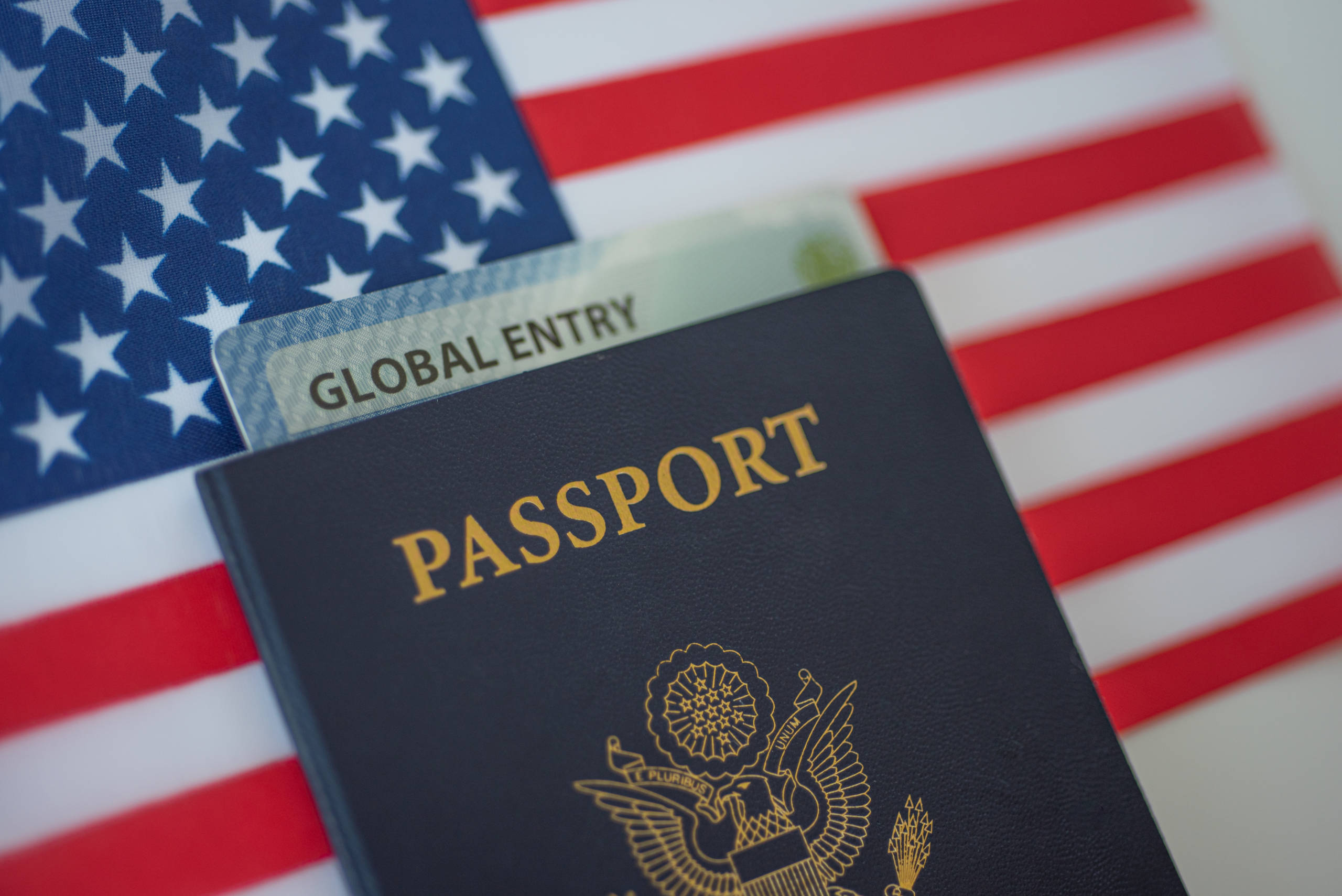 Global Entry Passport US Flag America shutterstock_1559127509