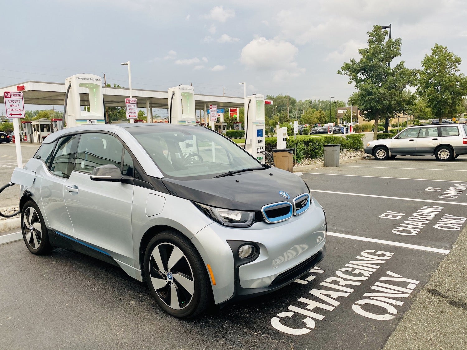 BMW i3 charging at a public charger