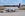 ALBUQUERQUE, NM - SEPTEMBER 28, 2014: A United Airlines worker services a United Express Embraer 170 passenger aircraft parked on the tarmac at Albuquerque International Sunport in New Mexico. (Photo by Robert Alexander/Getty Images)