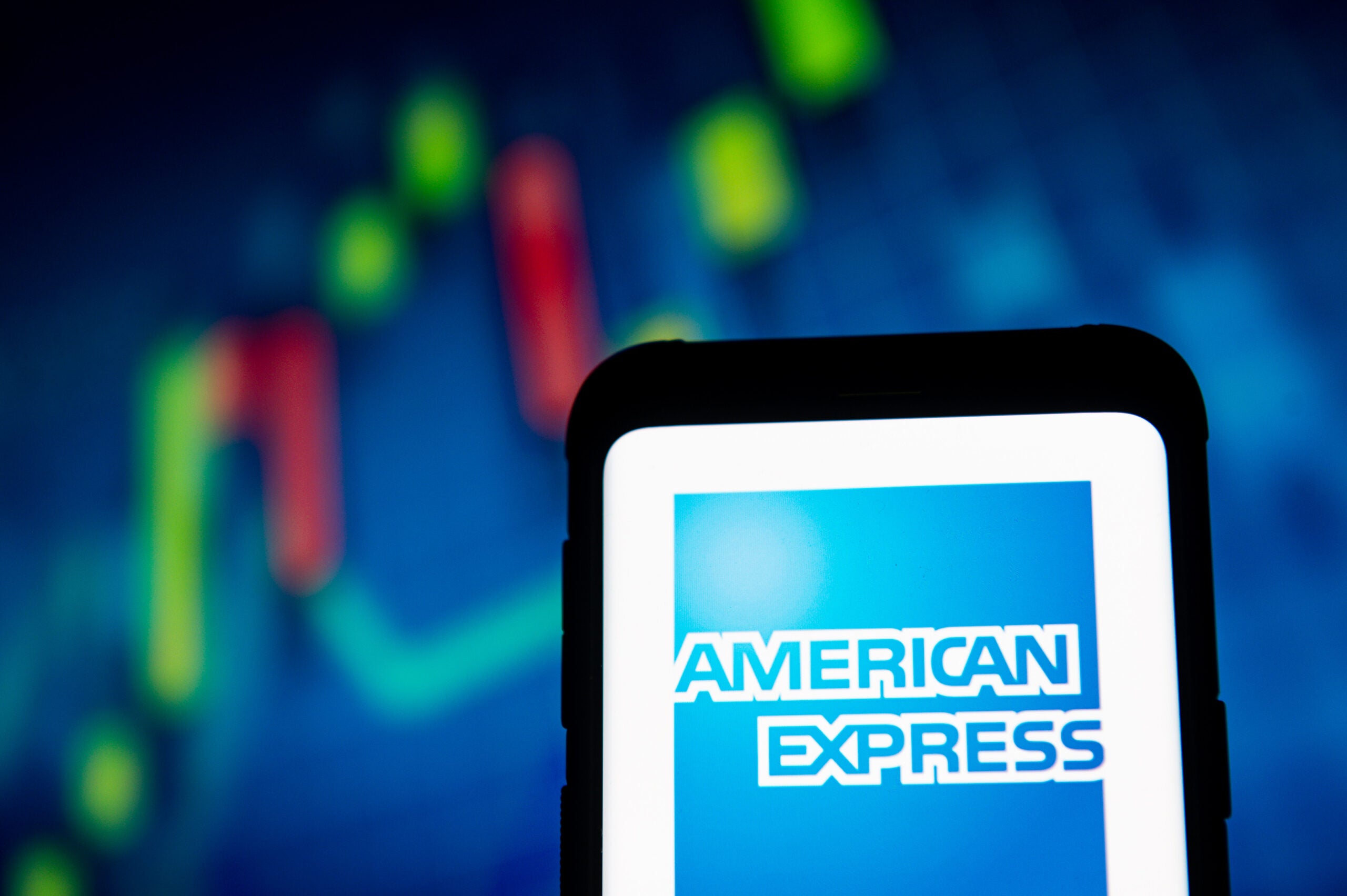 In this photo illustration an American Express logo seen