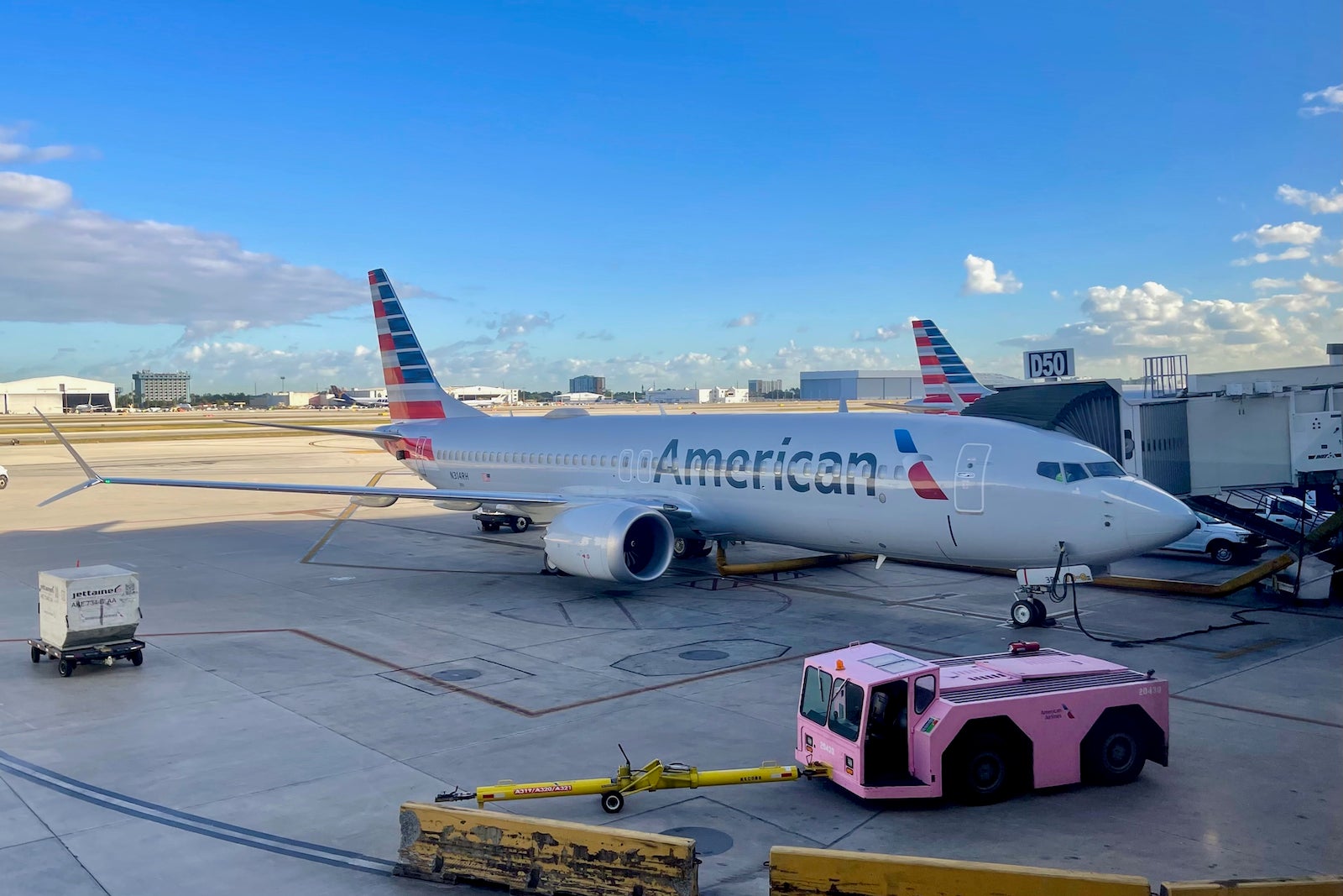An American Airlines plane parked at an airport.