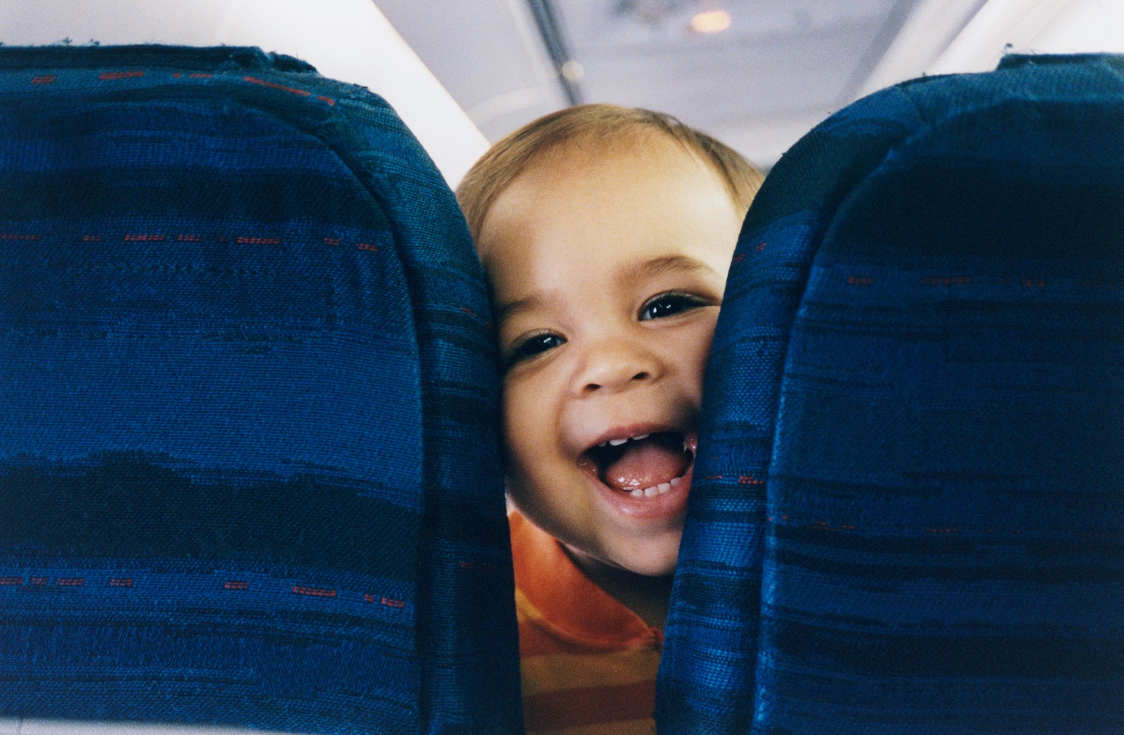 Baby Between Airplane Seats