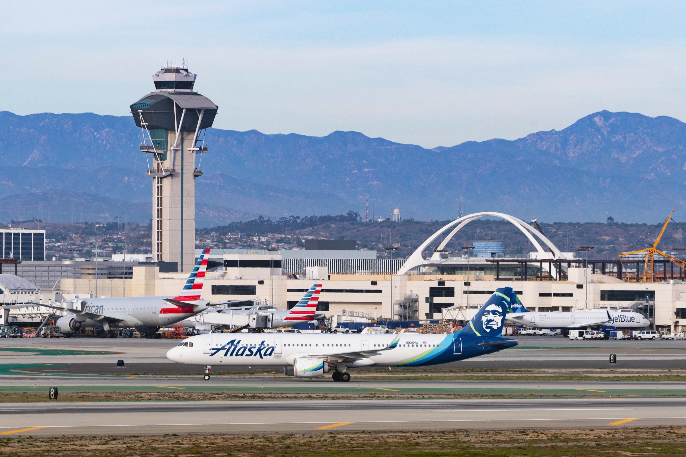 Alaska and American planes on the runway at LAX