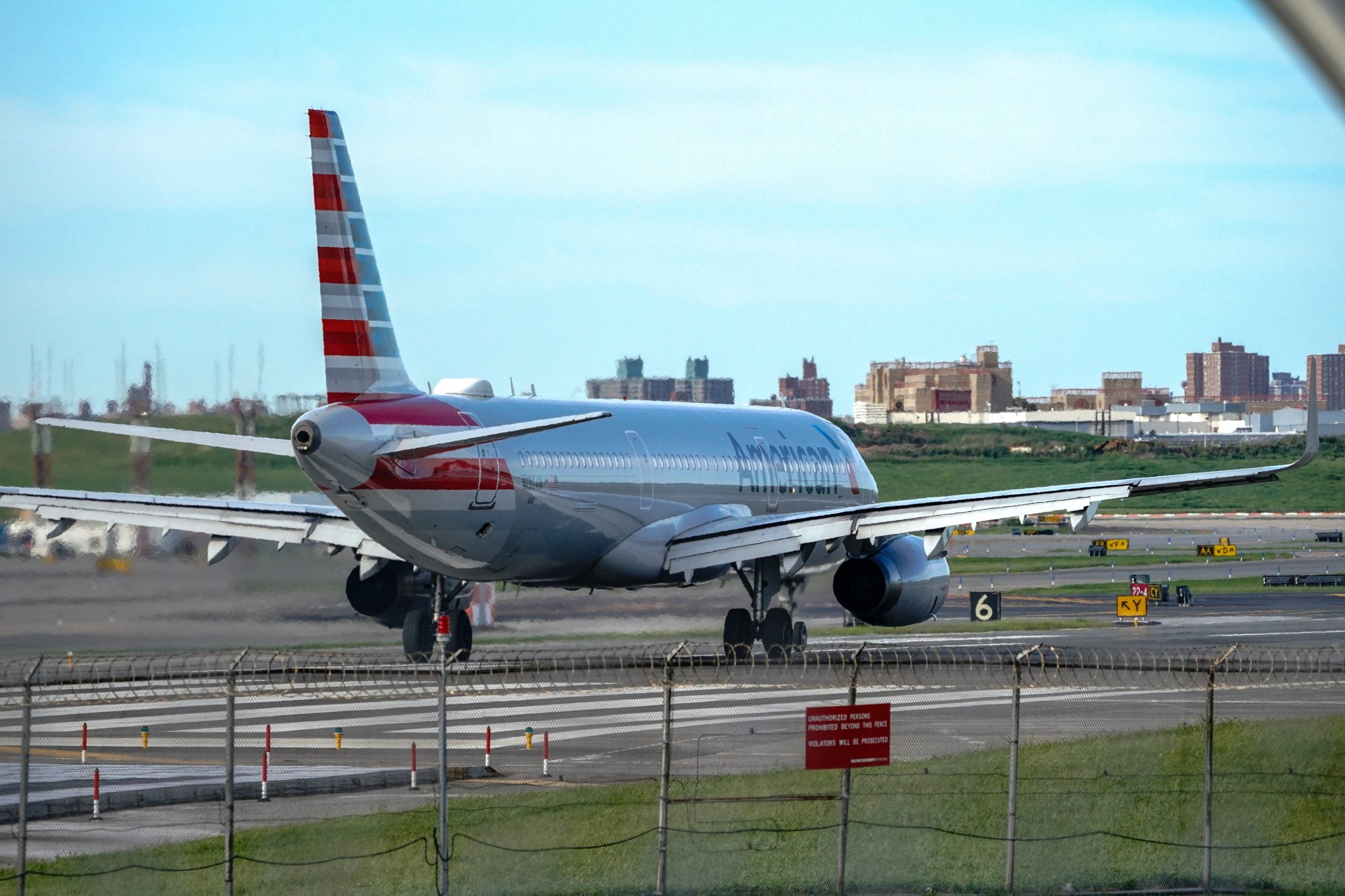 American Airlines aircraft taxiing at La Guardia Airport.