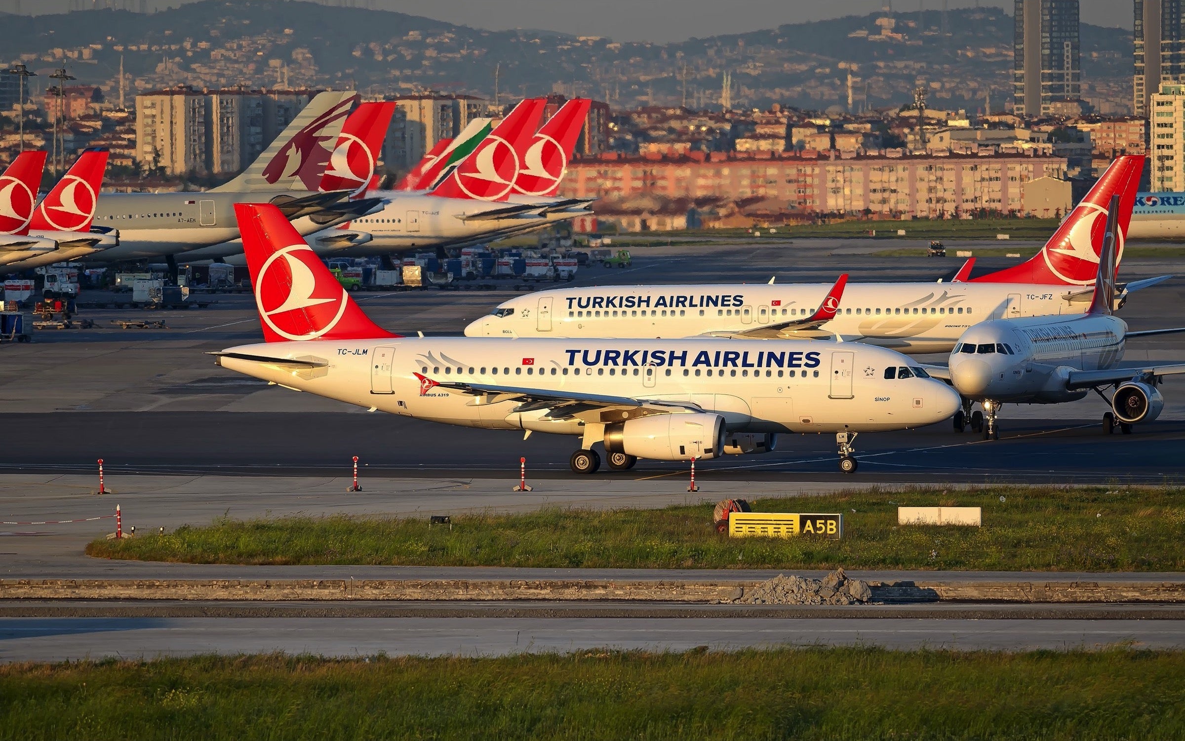 Turkish Airlines planes on the ground at IST airport
