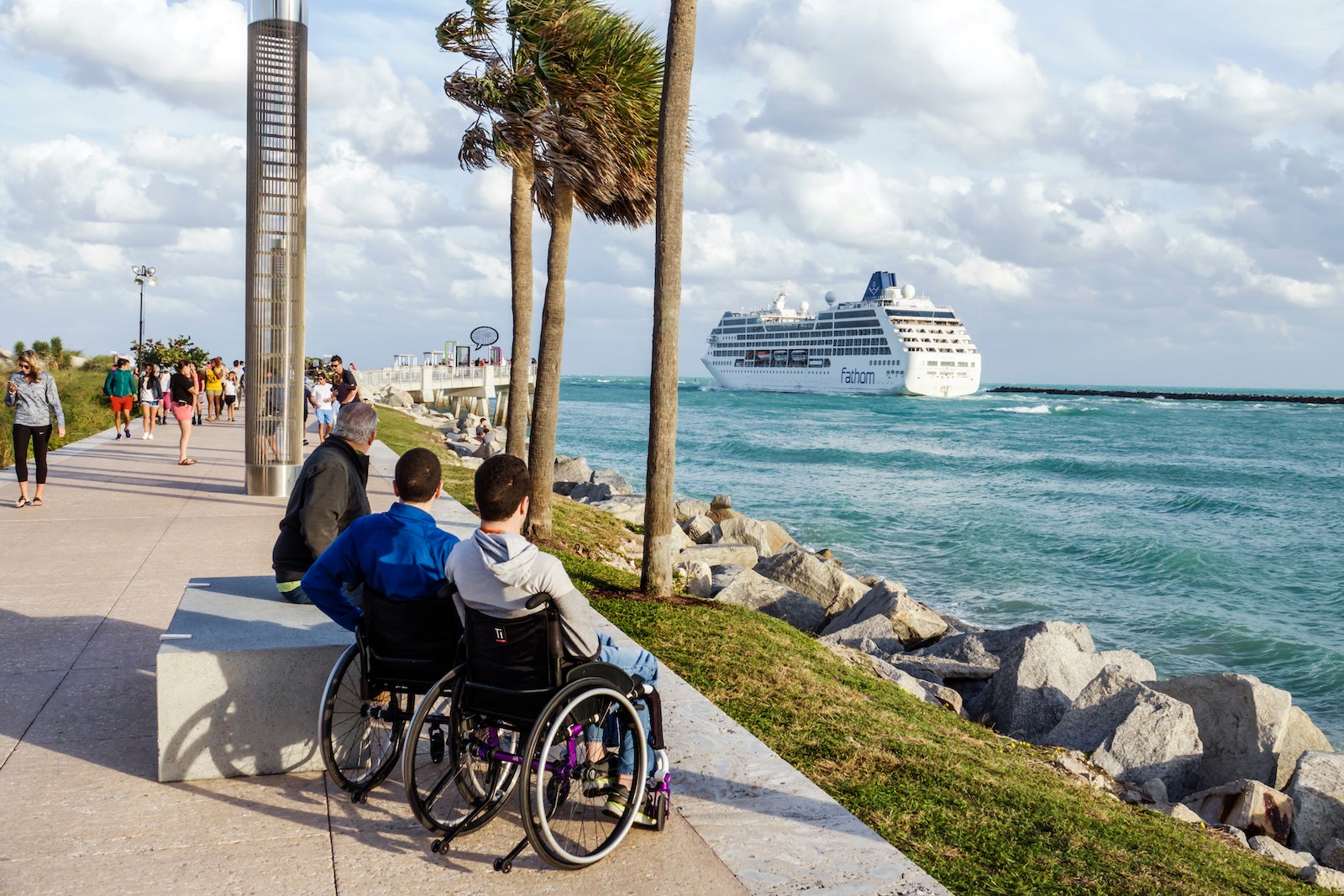 Miami Beach, Government Cut, Tourists in Wheelchair watching Cruise Ship