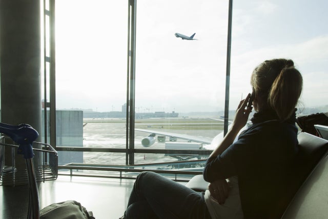 Woman at the airport waiting for a fly