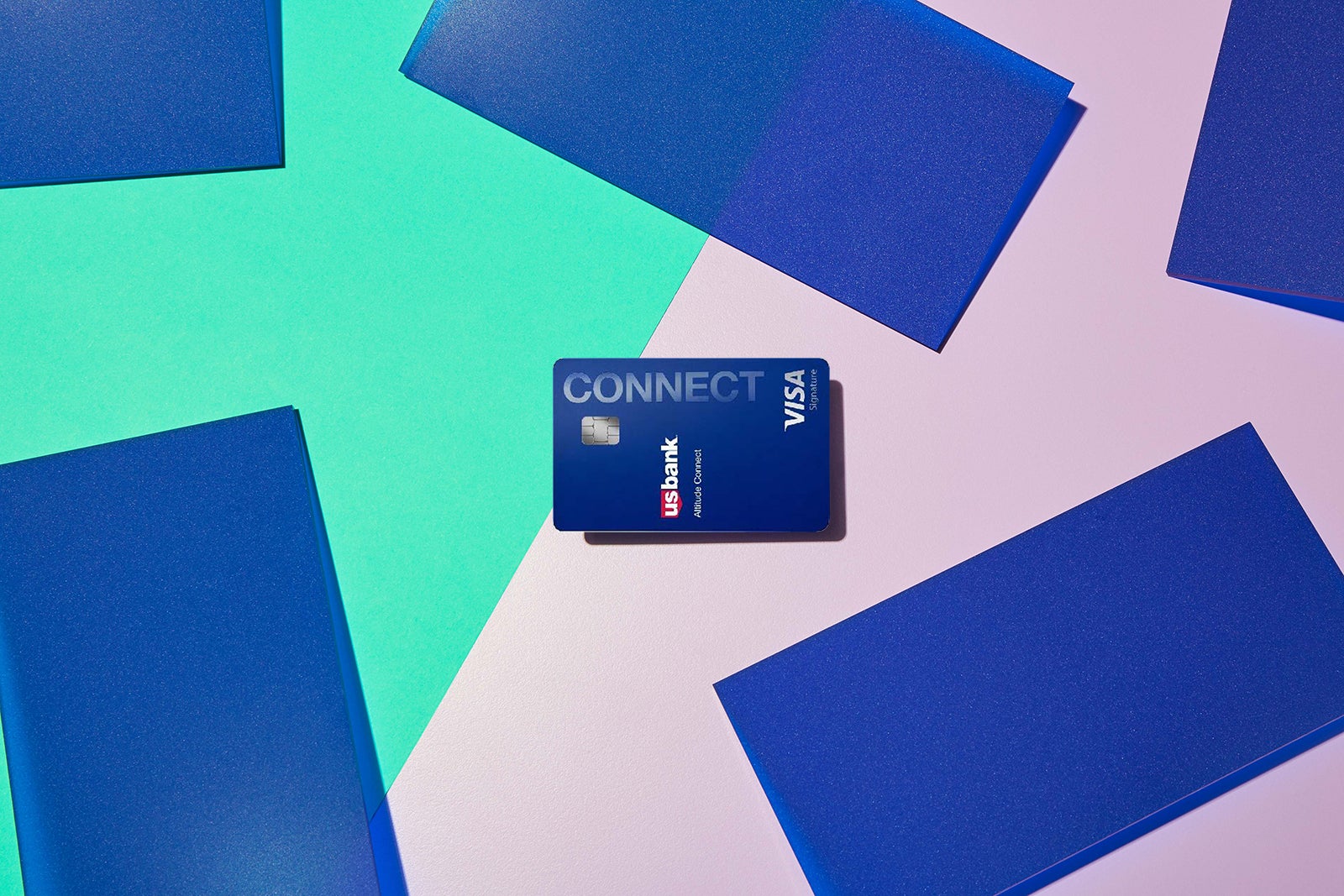A credit card against a multi-colored background