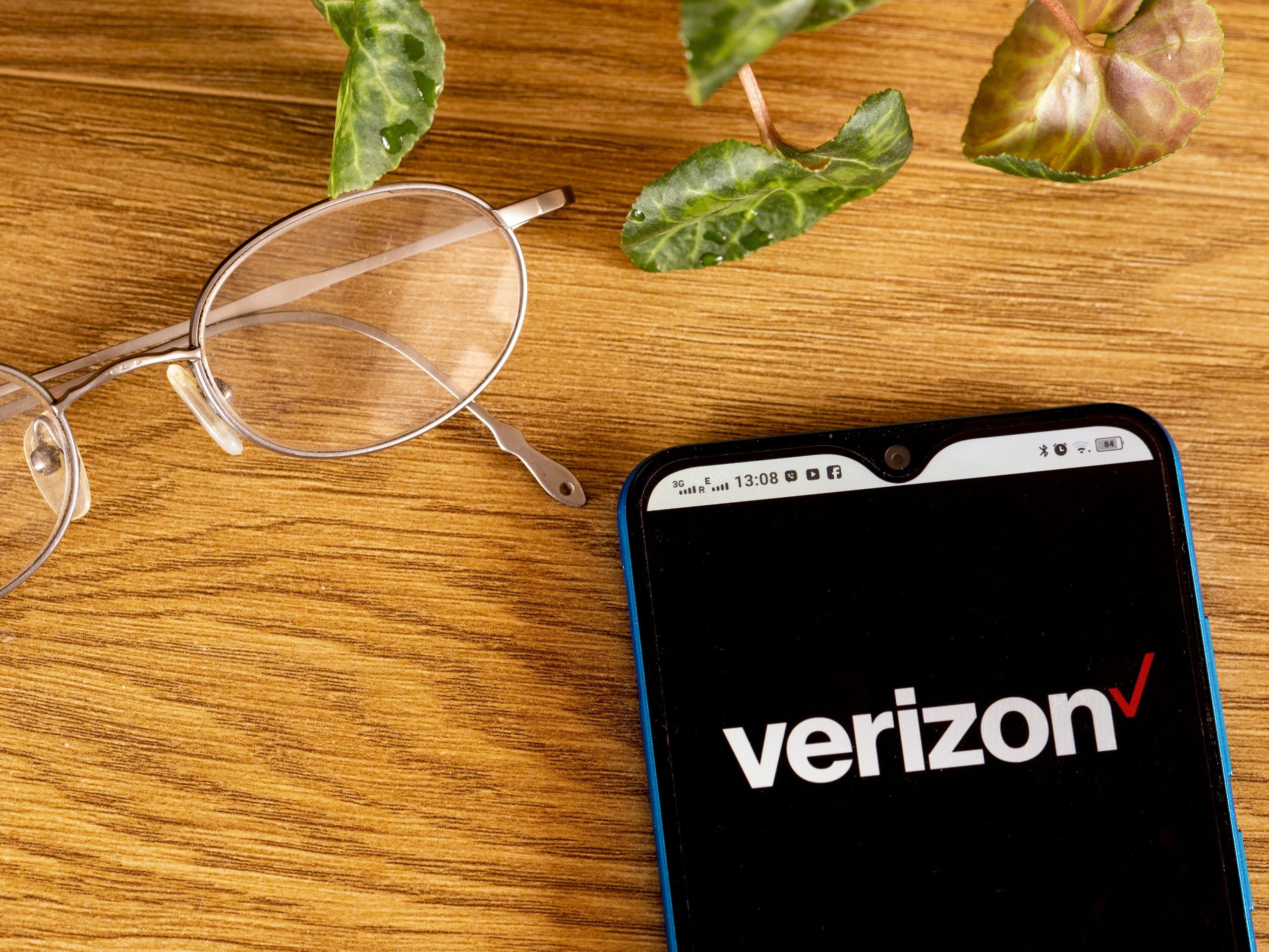 In this photo illustration a Verizon Wireless logo seen