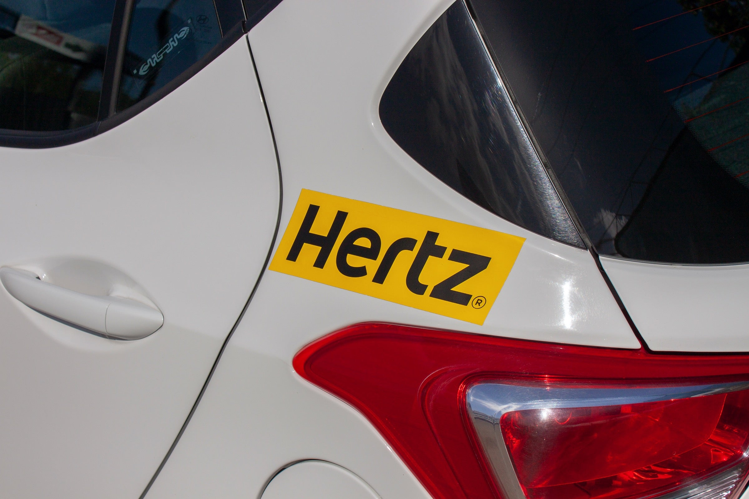 Hyundai car with a Hertz sticker