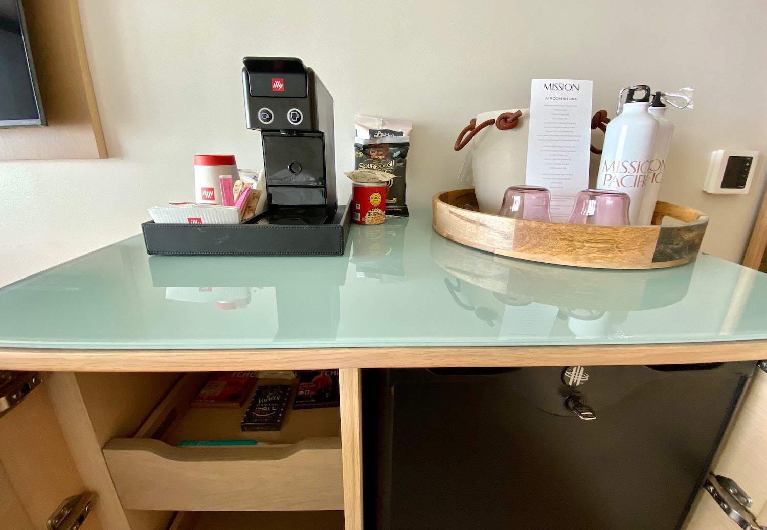 Snack station with coffee maker, cups and bottles