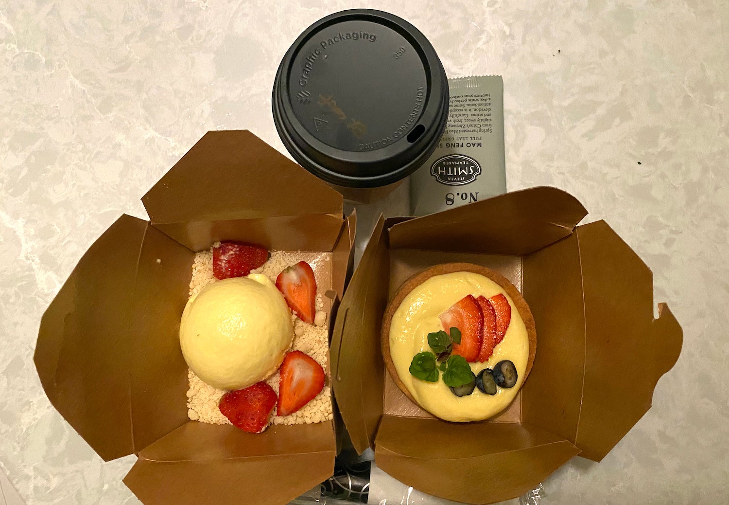 Pana cotta and lime tart in a paper container
