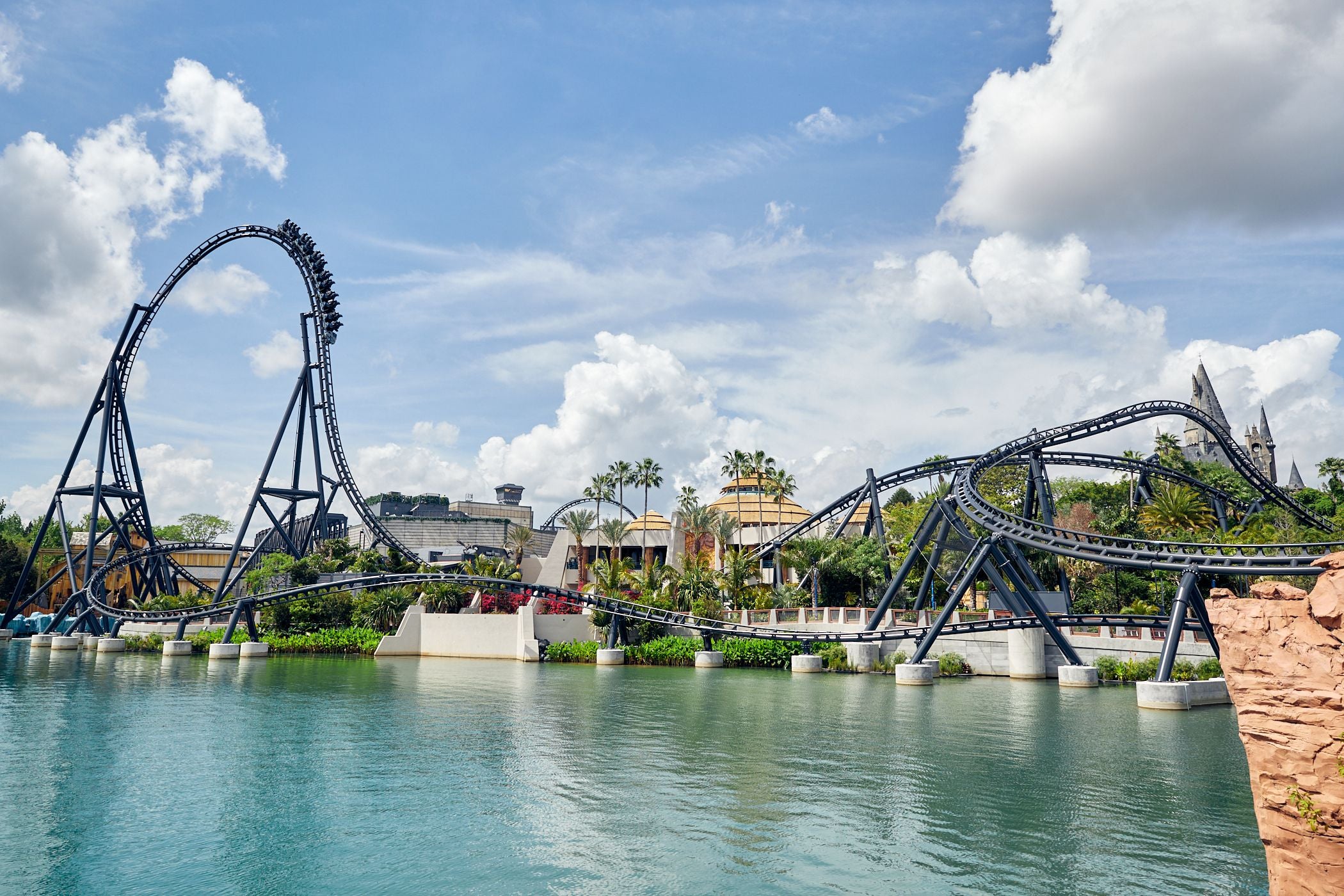 Jurassic World Velocicoaster photographed from the water