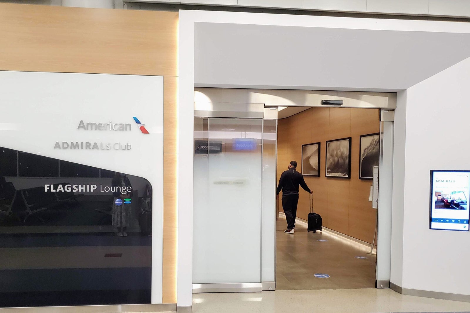 Easiest way to get Admirals Club airport lounge access and share it - The  Points Guy - The Points Guy